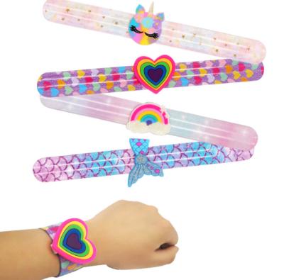 China Custom China Europe Kids Slap Bands Shiny Slap Bracelet Bangle Pink Silicone Snap Bracelet For Girls for sale