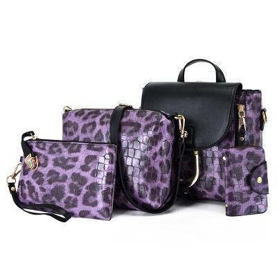 China Wholesale fashion leopard print PU shoulder ladies leather handbags set 4 in 1 handbag set with with backpack strap for sale