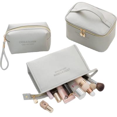 China Promotional Custom Large Capacity Multi-colors 3 Pcs Set Cosmetics Woman Beauty Bags Luxury Makeup Organizer For Brushes for sale