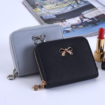 China Daily Use Ladies Card Holder Bowknot Letter Women Small Size Money Cut Short Wallet Girls Zipper Coin Purse for sale