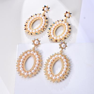 China FASHIONABLE Vintage Gold Ladies Diamond Pearl Hoop Earrings Women Oval Baroque Pearl Earrings Jewelry for sale