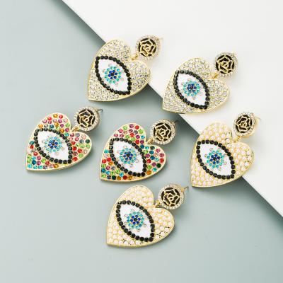 China Large Fashionable Exaggerated Multicolor Rhinestone Heart Eye Earrings Women for sale