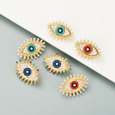 China 2021 Fashion Trendy Vintage Gold Metal Seed Bead Eye Stud Earrings For Boho Pearl Earring Jewelry for sale