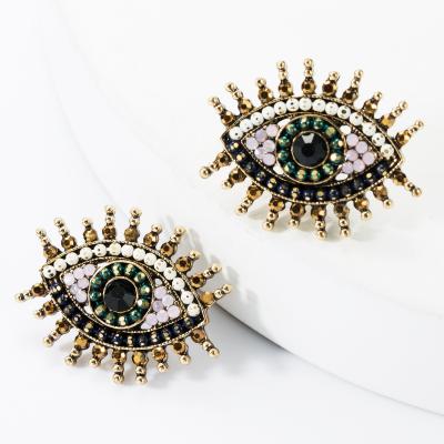 China TRENDY Fashion Beaded Eye Stud Earrings Women Eye Statement Eye Earrings Jewelry for sale