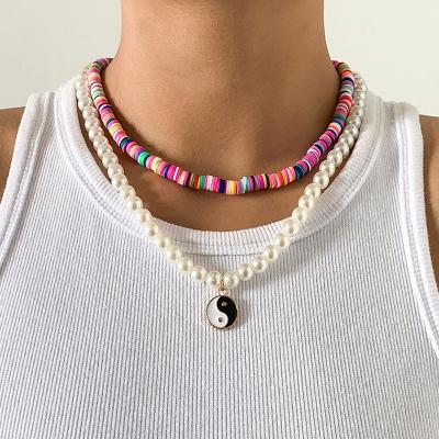 China Simple Geometric Imitation Tai Chi Pendant Necklace Pearl Clay Beads Necklace Women Sweet Colorful New Design NK-1256 Punk Chain for sale