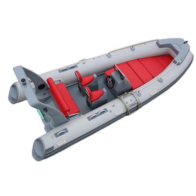 China Good quality china manufacture fiberglass hot sale rigid hull fiberglass rib inflatable boat with outboard motor for sale