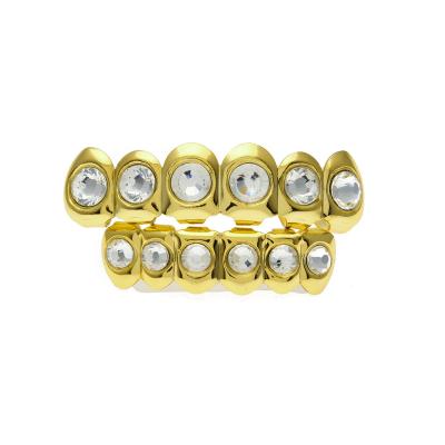 China Comfort Fit 6+6 Big Zircon Teeth Grillz Real Gold Punk Teeth Plated Say Gold Dental Lip Grillz For Women Men Body Jewelry for sale