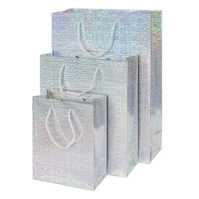 China 2021 size striation cardboard plain handmade paper bags for gift packaging with handles holographic paper bags maker for sale