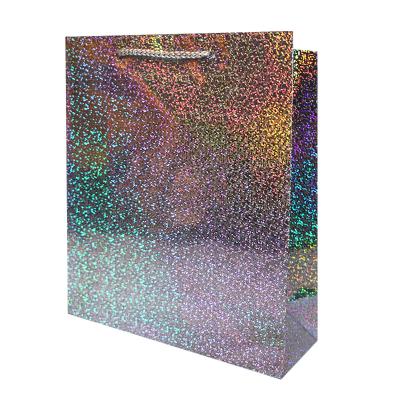 China Dots Glitter Paper Bags With Handmade Shiny Handles Gift Packaging Laser Single Dots Holographic Drawstring Cardboard Paper Gift Bags for sale