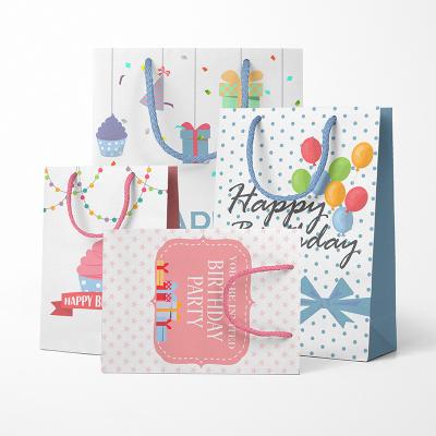 China New Arrival Handmade Fashion Printed Birthday Gift Packaging Cardboard Paper Bag For Gift Paper Bags With Handles for sale