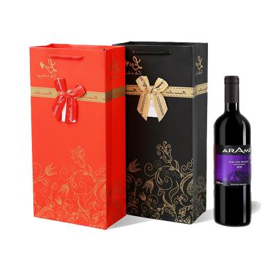 China Fashion Design Wine Paper Bag Maker With Handles Strong Handmade High Quality Bottom For Beer Wine Packaging Paper Bags for sale