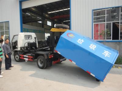 China Chang’an 4*2 LHD mini hook lifter garbage truck for sale,best price and high quality Chang'an skid loader for sale for sale