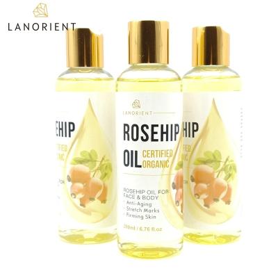 China LANORIENT 200ml Skin Revitalizer OEM Private Label Natural Organic Seed Moisturizing Whitening Brighten Face Body Rosehip Oil For Face for sale