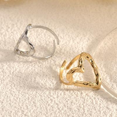 China TRENDY Hypo Allergenic Jewelry Heart Shape Ring Gold Couple Stainless Steel Forever Love Ring Vintage Big Hollow Heart Ring for sale