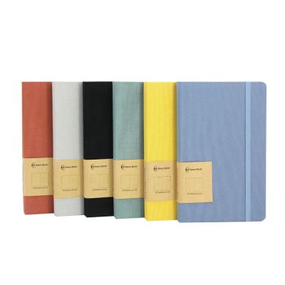 China 2020 hardcover book A5 100gsm canvas fabric planner notebook with lined inner page for sale