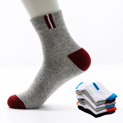 China Custom Logo Antibacterial Custom Design Pattern Men Tube Cotton Fashion Socks White Colorful Crew Dress Socks Stock for sale