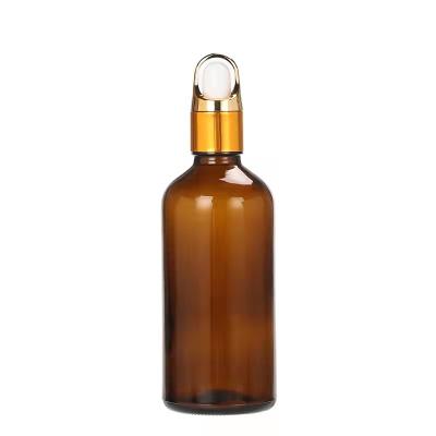 China Cosmetic 5ml 15ml 10ml Round Amber Glass Essential Oil Bottle Dropper With Matel Cap for sale