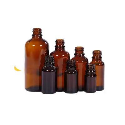 China 5ml 15ml 30ml Brown Essential Oil Bottles Glass Cosmetic Dropper Bottle With Screw Cap for sale