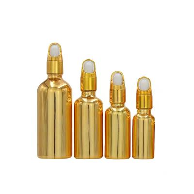 China Wholesale Cosmetic 10ml 15ml 50ml 100ml Brown Gold Essential Oil Glass Dropper Bottle for sale