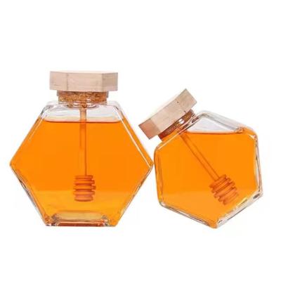 China High Quality Wood Lid Storage 220ml/380ml Bottle Stick Spoon Hexagon Honey Glass Jar Container With Wood Lid for sale