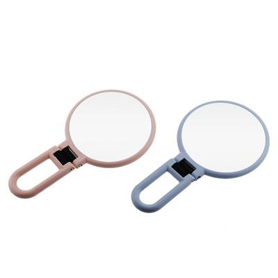 China Handle Magnifying Mirror Multifunctional Portable Folding Magnifying Beauty And Makeup Mirror for sale