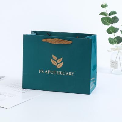 China Recyclable and Biodegradable Luxury Custom Printed Clothing Paper Bag Kraft Takeout Brown Bag for sale