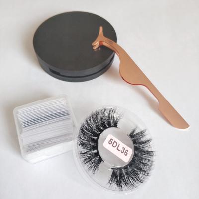 China Durable high quality vegan 5d crisscross mink whip eyelash set with tweezers and glue strips for sale