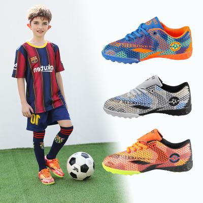 China Cheap Custom Wide Size 4 Hard Bottoms Youth Kids Deodorization Shoes White Football Turf Soccer Cleats Shoes For Big Kids for sale