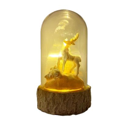 China Europe Popular Christmas Gifts LED Glass Dome Reindeer Resin Home Furniture for sale