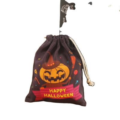 China Daily Life Canvas Halloween Party Gift Candy Bag Drawstring Goodie Bags Portable Halloween Candy Drawstring Bag for sale