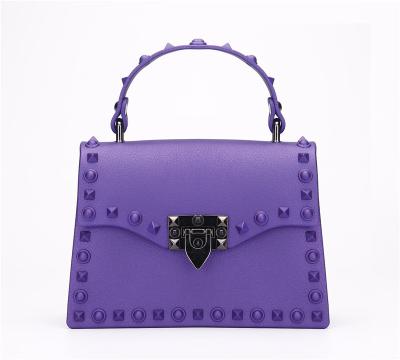 China Hot Selling Fashion Bag One Shoulder Chain Rivet Jelly Purse Rainbow Color Woman Shoulder Bag Main Popular Women Handbags for sale