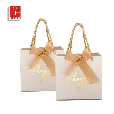 China Recyclable Custom Printed Your Own Logo White Brown Kraft Gift Craft Shopping Paper Bag With Ribbon For Christmas for sale