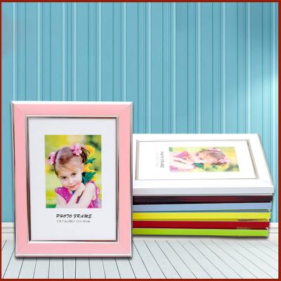 China Fashionable Wholesale Home Decorate Light Custom Elegant Art Picture Photo Frame 6Inch 7Inch Size Paper Size Plastic for sale