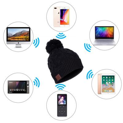 China JOINT Music Beanie Removable Winter Hats Wireless Stereo Warm Hat With Pompom for sale