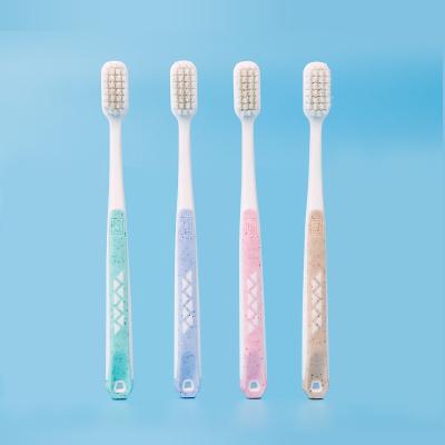 China Soft Rubber Top Fashion Newest Design 109# Ten Thousand Bristles 4 Colors Available Adult Toothbrush Soft Rubber for sale