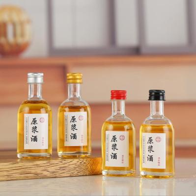 China Wholesale Mini 30ml 50ml 100ml Glass Alcohol Drink Whiskey Bottles zu verkaufen