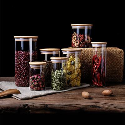 China Glass Airtight Kitchen Storage Jar Sealed Food Container Grains Canister Candy Jars with Bamboo Lid for sale