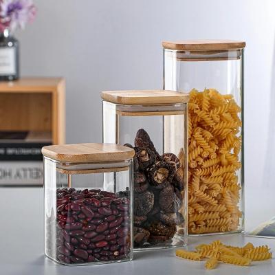 China Kitchen Storage Wood Lid Glass Airtight Canister Bottles For Grains Tea Coffee Beans Grains Candy for sale