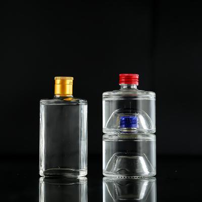 China 100ml mini spirits vodka gin liquor glass bottle and clear liquor glass bottle Te koop