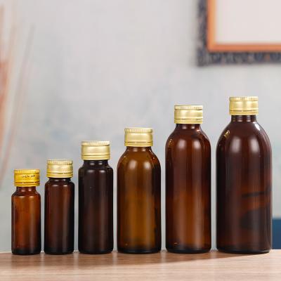 China Wholesale 20ml/30ml/50ml/100ml/200ml/250ml Amber Essential Oil Glass Bottle With Metal Plastic cap for sale