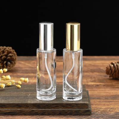 China 30ml Travel portable atomizer spray glass perfume bottle cylinder shape glass bottle for sale