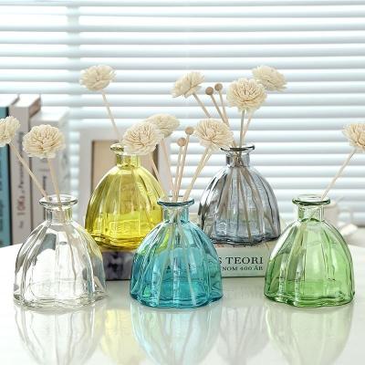 China Reed Diffuser Glass Bottle Empty Unique Essential Oil Perfume Glass Diffuser Bottles with Cork Lids zu verkaufen