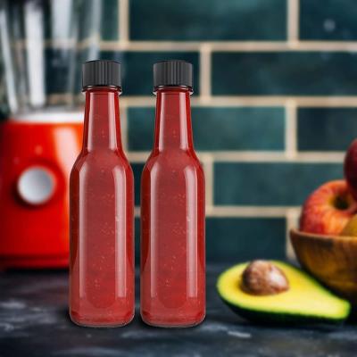 Κίνα 5oz 150ml Clear Empty Soy Sauce Glass Bottle Woozy Bottle With Clip Cap for Hot Sauce προς πώληση