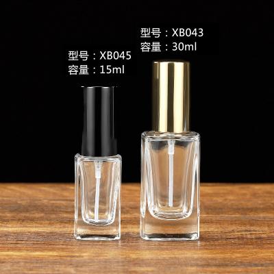 China Rectangle empty clear thick perfume glass bottle 15ml 30ml mini perfume spray glass bottle for sale