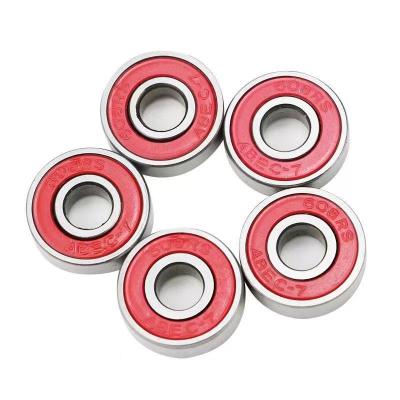 China Hot Selling rs Deep Groove Ball Bearing 608 Hotels Ball Bearing With Red Plastic Dust Cover Abec 7 Bearings For Skateboard for sale