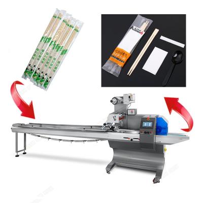 China Food Tableware packaging machine multi-function pillow flow packing machine automatic wrapping machine sealing disposable goods for sale