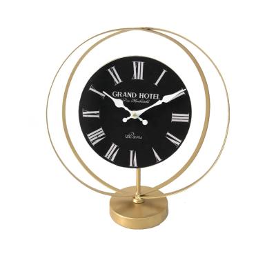 China Cheap High Quality Luxury Gold Modern Funny Clock Antique Style Quartz Table Clock Design Living Room Bedroom Decoration Alarm Desk for sale