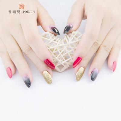 China 2021 Design Luxury Wedding Fake Nails Long Fale Nails Artificial Press Tips Red Stiletto With Glue for sale