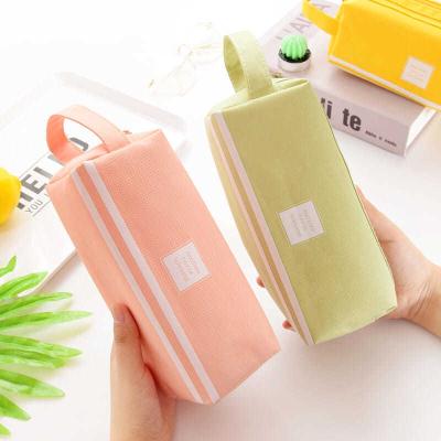 China Large capacity stylus pencil case with creative and multifunctional double-layer handle pencil case for sale