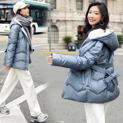 China Waterproof 2021 winter women hooded zipper down jackets China fashion temperament goose down jackets ladies coat customization for sale